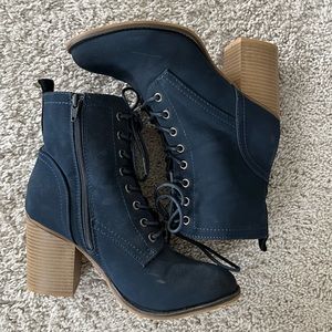 Just Fab navy lace up heeled boots.